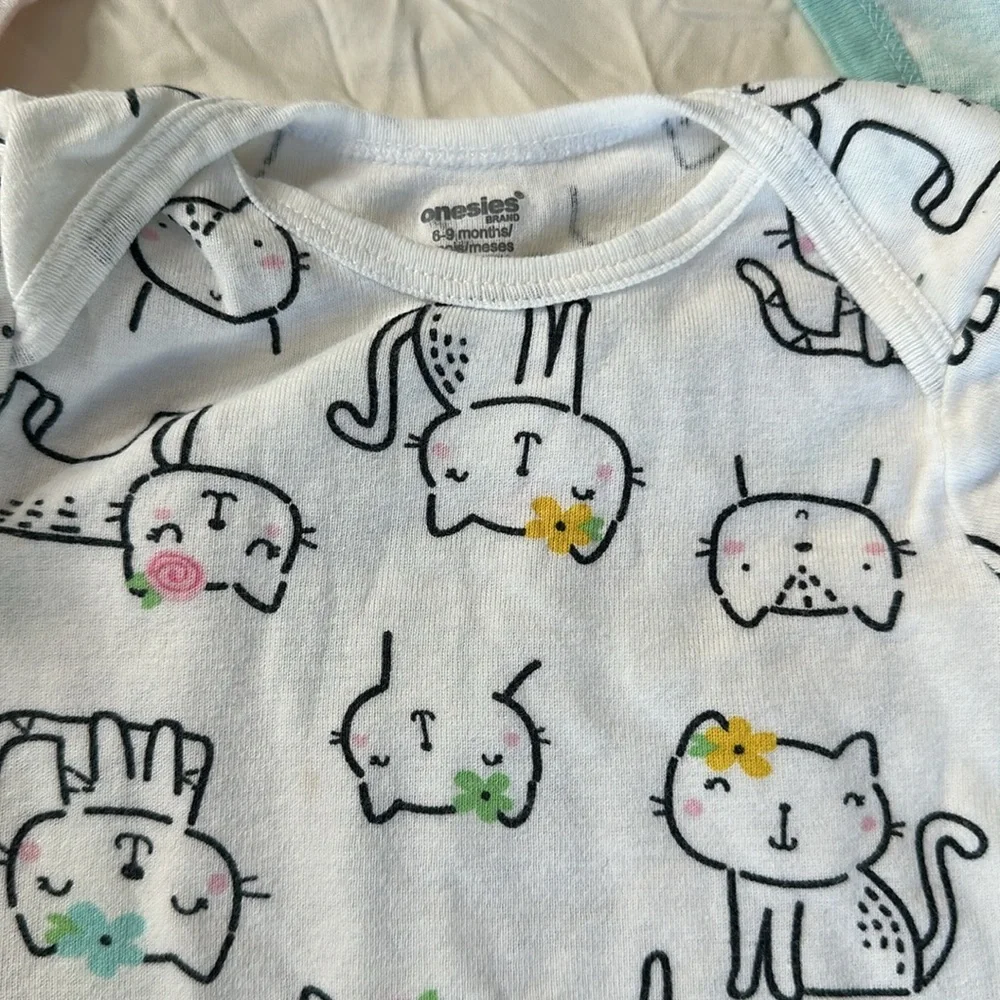 Onesie brand set of 7, size 6-9 month short sleeve bodysuits. GREAT CONDITION.